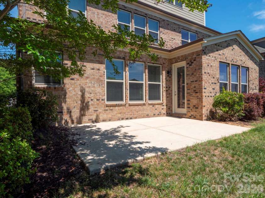1719 Emory Oak Drive, Charlotte, NC 28270.  MLS# CAR4379613, YatesRealty ID 24775. Back patio