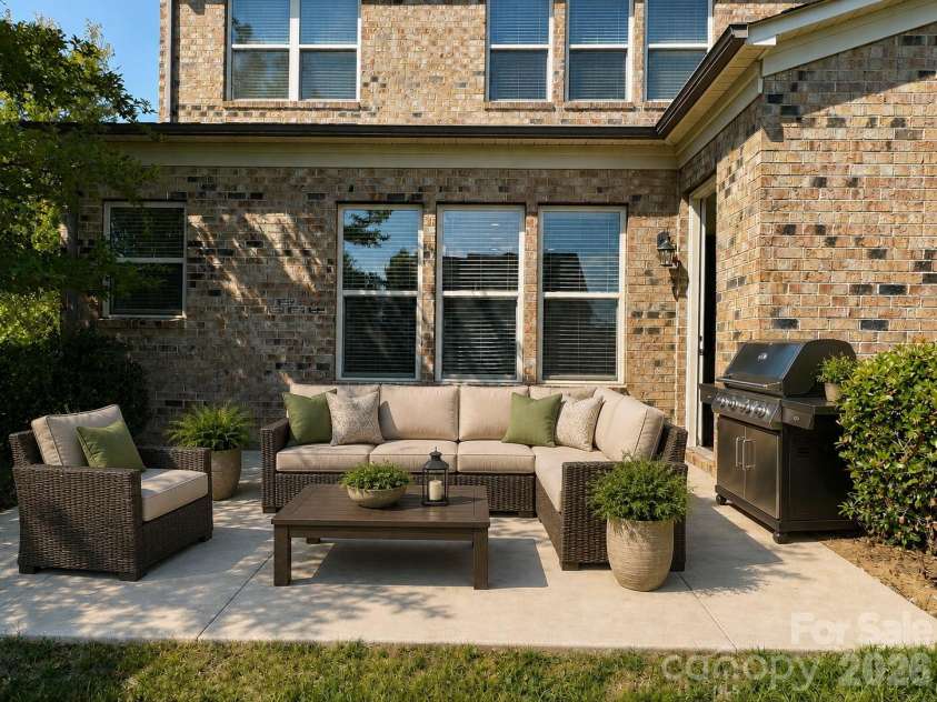 1719 Emory Oak Drive, Charlotte, NC 28270.  MLS# CAR4379613, YatesRealty ID 24775. Back patio Virtual staging