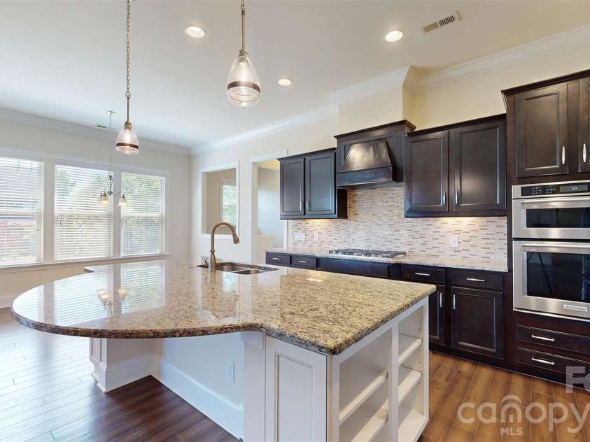 1719 Emory Oak Drive, Charlotte, NC 28270.  MLS# CAR4379613, YatesRealty ID 24775. Kitchen huge island