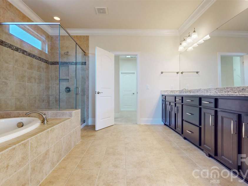 1719 Emory Oak Drive, Charlotte, NC 28270.  MLS# CAR4379613, YatesRealty ID 24775. Master bath