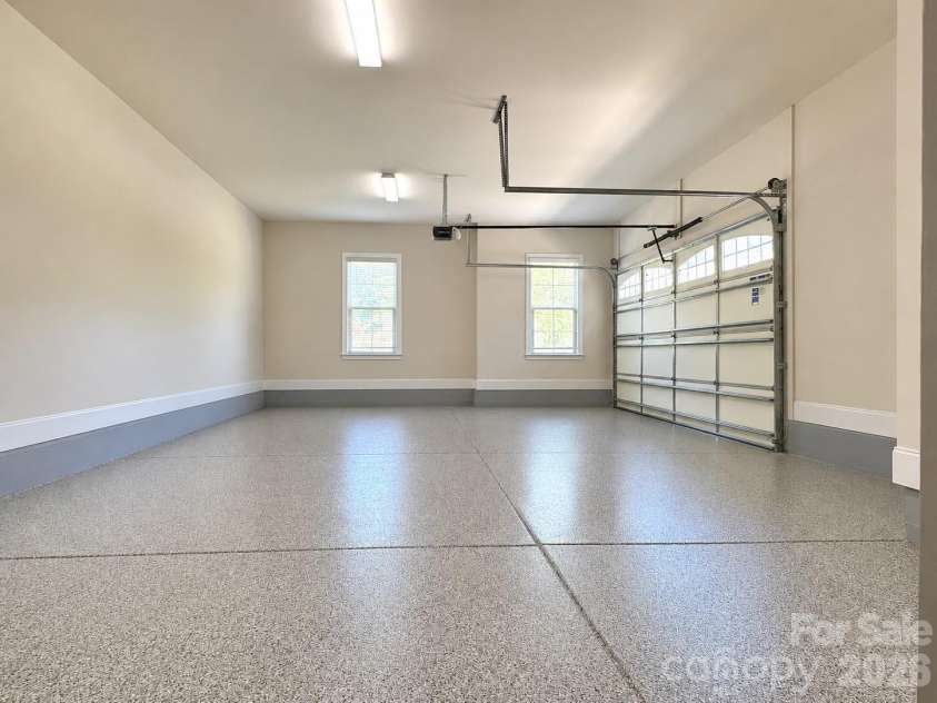 1719 Emory Oak Drive, Charlotte, NC 28270.  MLS# CAR4379613, YatesRealty ID 24775. New epoxy garage floor