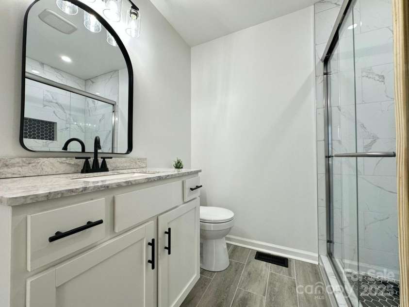 307 Sunset Drive, Monroe, NC 28112.  MLS# CAR4269503, YatesRealty ID 24783. Elegant Main Bathroom