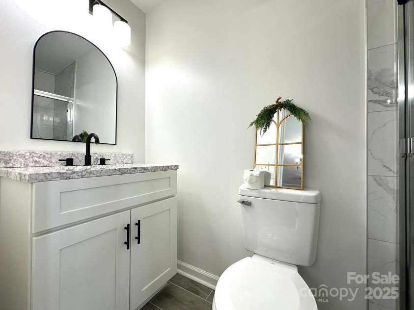 307 Sunset Drive, Monroe, NC 28112.  MLS# CAR4269503, YatesRealty ID 24783. Elegant Secondary Bathroom