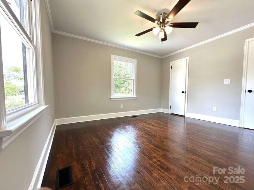 307 Sunset Drive, Monroe, NC 28112.  MLS# CAR4269503, YatesRealty ID 24783. Refinished Hardwood Floors - Bedroom