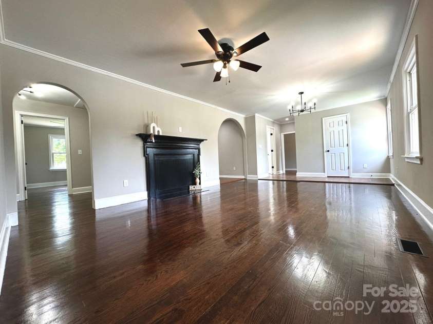 307 Sunset Drive, Monroe, NC 28112.  MLS# CAR4269503, YatesRealty ID 24783. Refinished Hardwood Floors - Living room