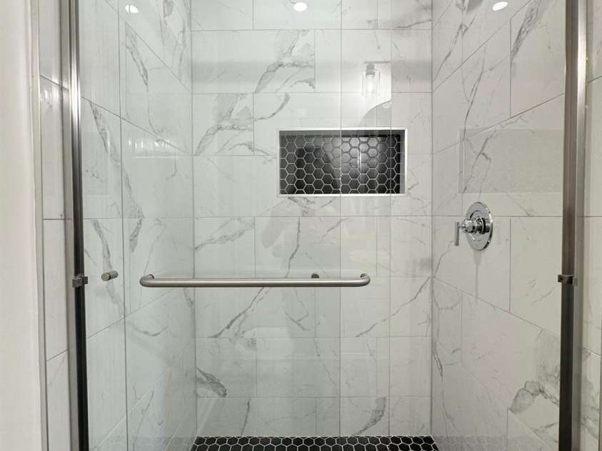 307 Sunset Drive, Monroe, NC 28112.  MLS# CAR4269503, YatesRealty ID 24783. Tile Shower