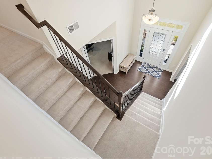 1989 Topaz Plaza, Davidson, NC 28036.  MLS# CAR4373611, YatesRealty ID 24786. Open Foyer / Stairs