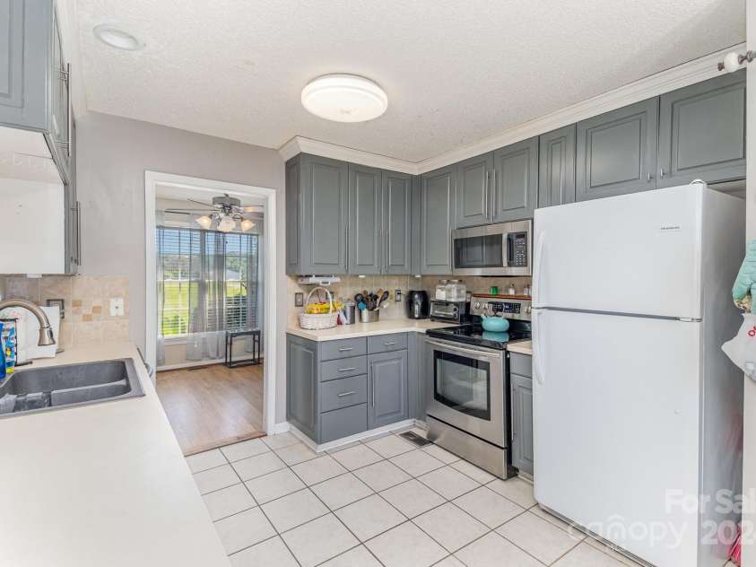 4012 Watson Church Road, Monroe, NC 28110.  MLS# CAR4173279, YatesRealty ID 2479. Before painting and counter tops