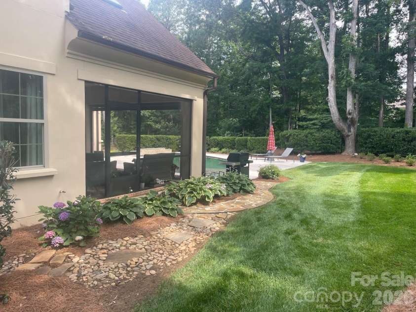 4231 Piaffe Avenue, Mint Hill, NC 28227.  MLS# CAR4356872, YatesRealty ID 24790. Backyard Oasis Offering Privacy and Serenity.