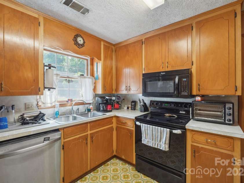 203 Shuping Street, Morganton, NC 28655.  MLS# CAR4270750, YatesRealty ID 24796. 