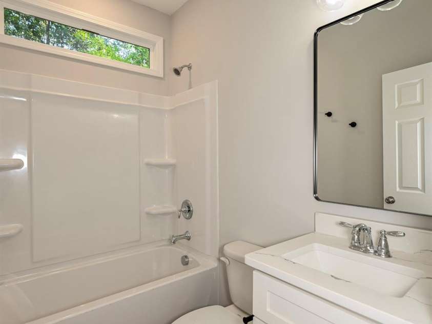 1818 New Salem Road, Monroe, NC 28110.  MLS# CAR4382625, YatesRealty ID 24797. Downstairs hall bath