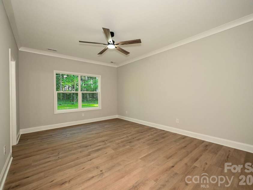 1818 New Salem Road, Monroe, NC 28110.  MLS# CAR4382625, YatesRealty ID 24797. Master bedroom