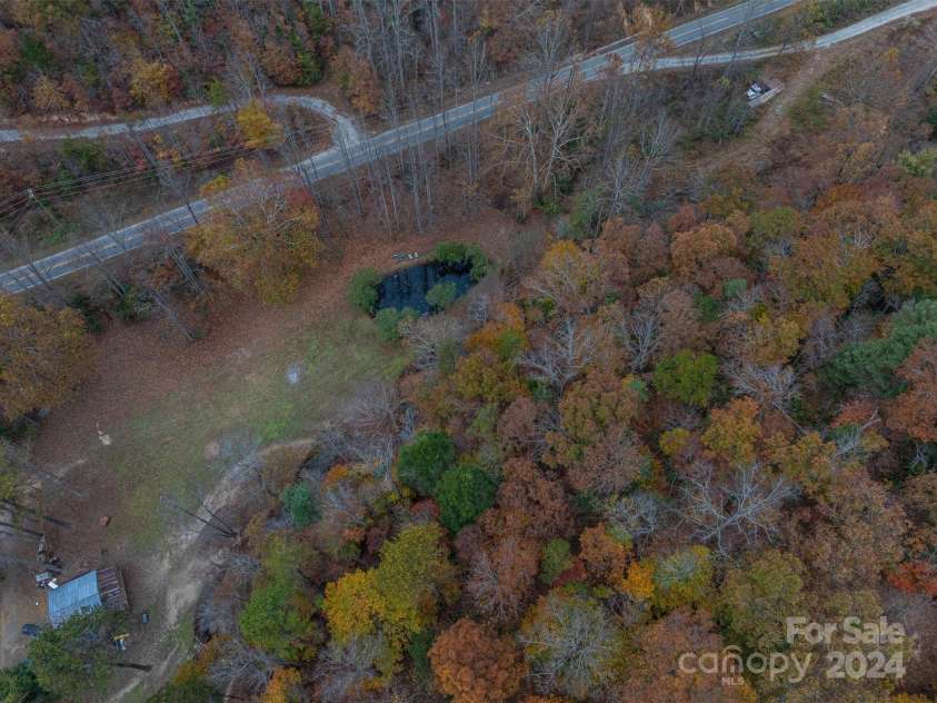 5016 NC Hwy 90 Highway, Collettsville, NC 28611.  MLS# CAR4195400, YatesRealty ID 248. Pond and Pasture Aerial
