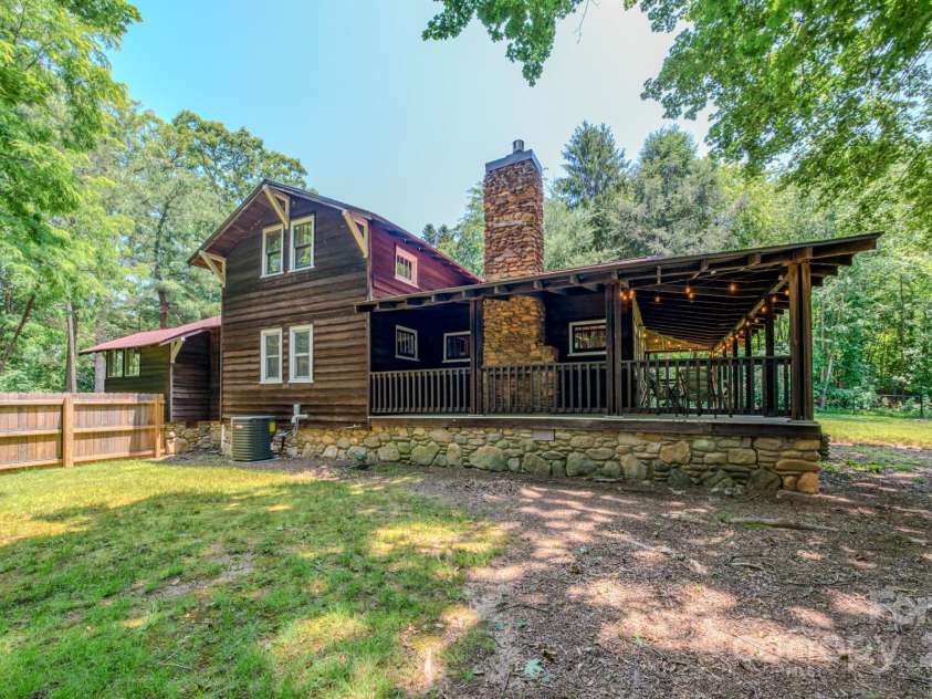 7 Bachelder Lane, Candler, NC 28715.  MLS# CAR4271857, YatesRealty ID 24801. Outside fireplace