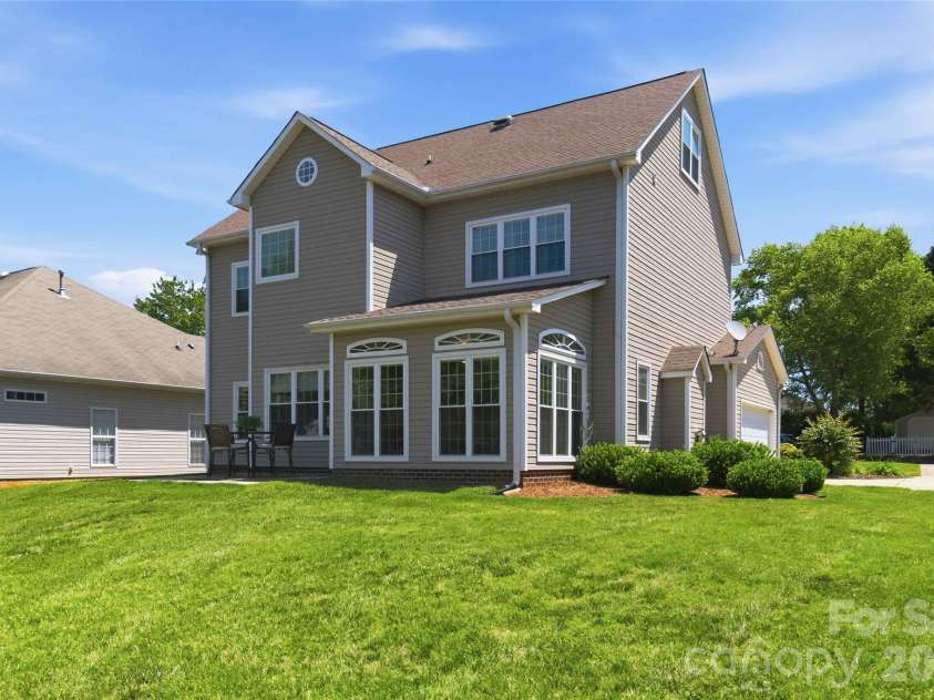 124 Elizabeth Hearth Road, Mooresville, NC 28115.  MLS# CAR4380712, YatesRealty ID 24802. Flat backayard