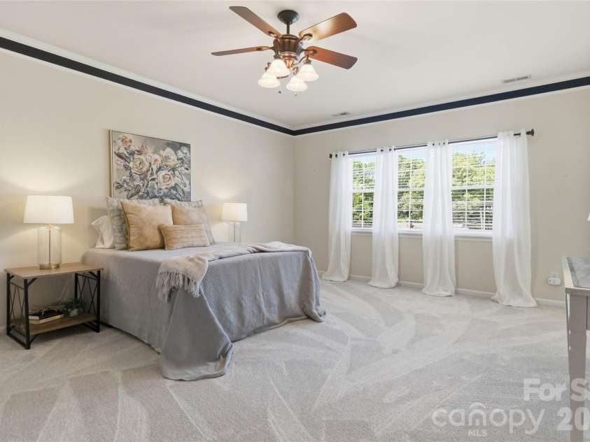 124 Elizabeth Hearth Road, Mooresville, NC 28115.  MLS# CAR4380712, YatesRealty ID 24802. Primary suite is oversized.  