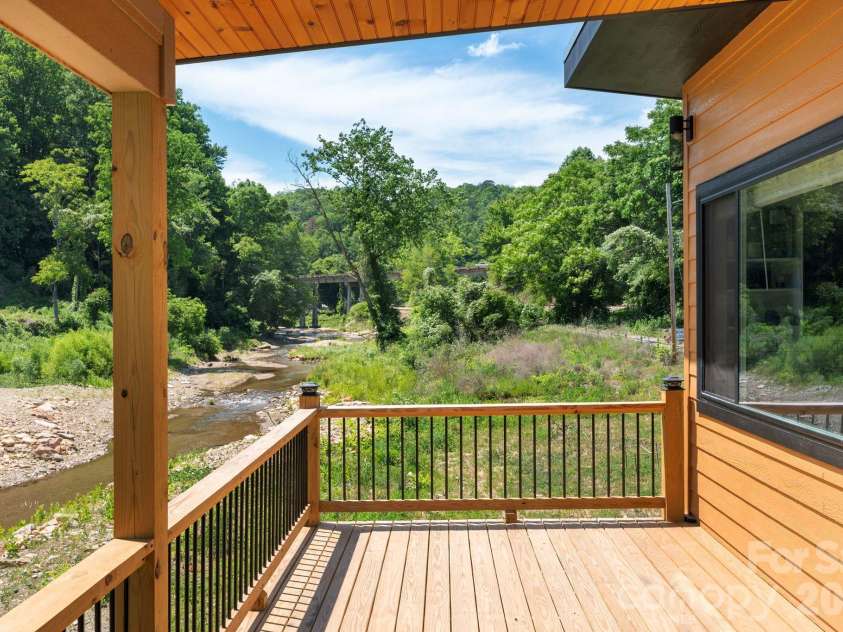 167 Commerce Street, Old Fort, NC 28762.  MLS# CAR4384526, YatesRealty ID 24803. Spacious Wrap-Around Deck