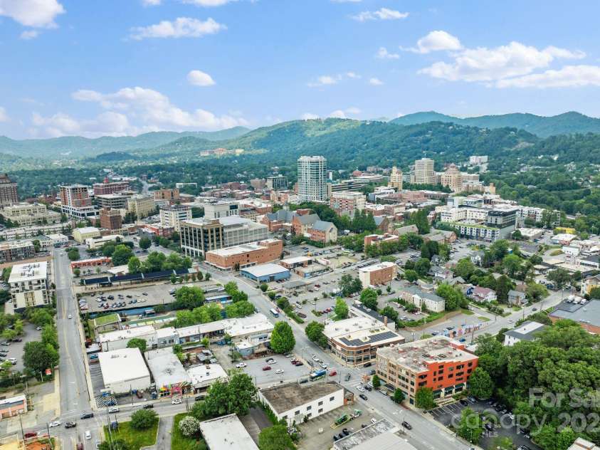 100 Coxe Avenue, Asheville, NC 28801.  MLS# CAR4271737, YatesRealty ID 24809. Aerial shot of neighborhood