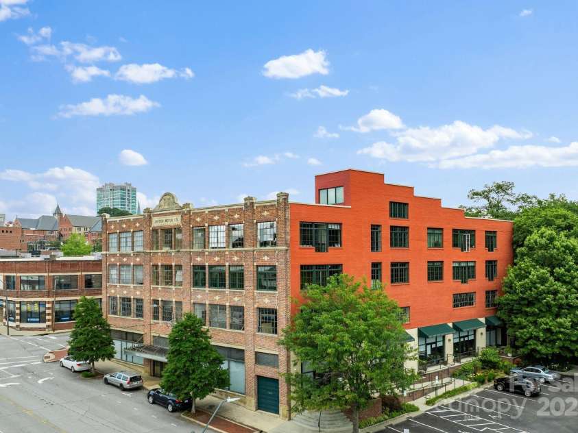 100 Coxe Avenue, Asheville, NC 28801.  MLS# CAR4271737, YatesRealty ID 24809. Coxe side of building