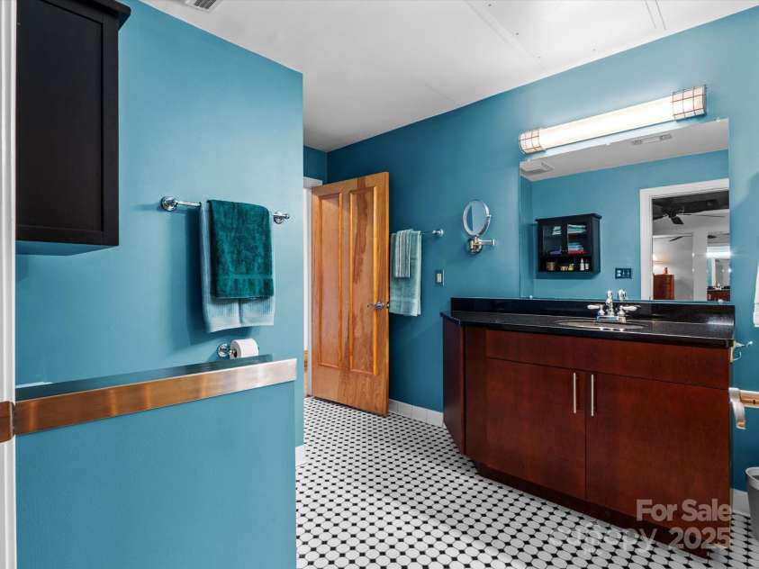 100 Coxe Avenue, Asheville, NC 28801.  MLS# CAR4307768, YatesRealty ID 24809. Clean, bright design ready for your personal touches