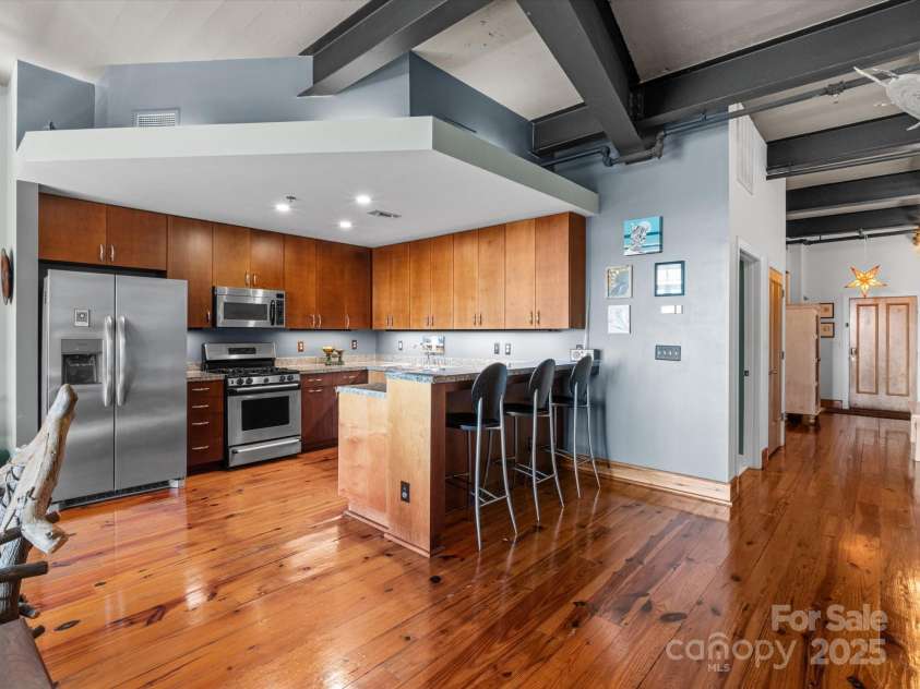 100 Coxe Avenue, Asheville, NC 28801.  MLS# CAR4307768, YatesRealty ID 24809. Functional layout with well-planned storage and counter space for everyday cooking
