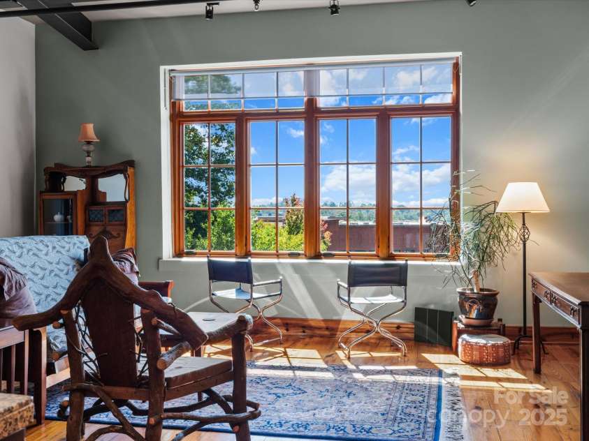 100 Coxe Avenue, Asheville, NC 28801.  MLS# CAR4307768, YatesRealty ID 24809. Historic character preserved with modern updates throughout