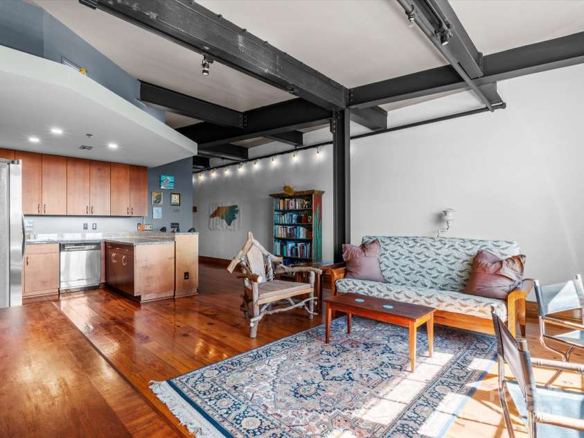 100 Coxe Avenue, Asheville, NC 28801.  MLS# CAR4307768, YatesRealty ID 24809. Iconic Sawyer Motor Building - a historic downtown Asheville landmark