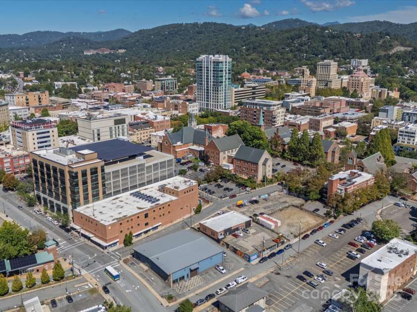 100 Coxe Avenue, Asheville, NC 28801.  MLS# CAR4307768, YatesRealty ID 24809. Walkable lifestyle—steps from dining, entertainment, and the arts district