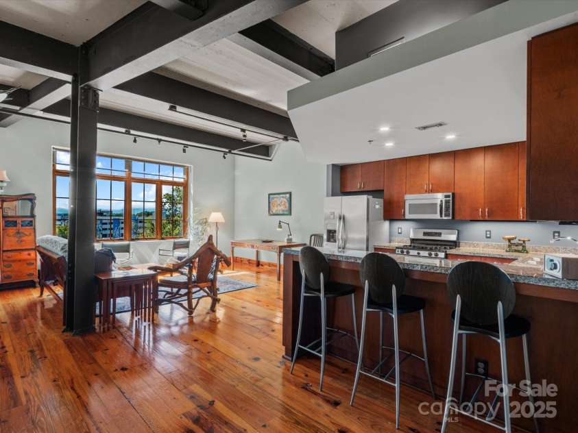 100 Coxe Avenue, Asheville, NC 28801.  MLS# CAR4307768, YatesRealty ID 24809. Welcome to Unit 306 at the Sawyer Motor Building Condominiums