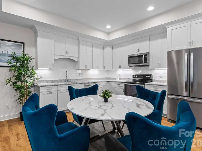111 Abbeville Lane, Mooresville, NC 28117.  MLS# CAR4368339, YatesRealty ID 24809. Basement Kitchen