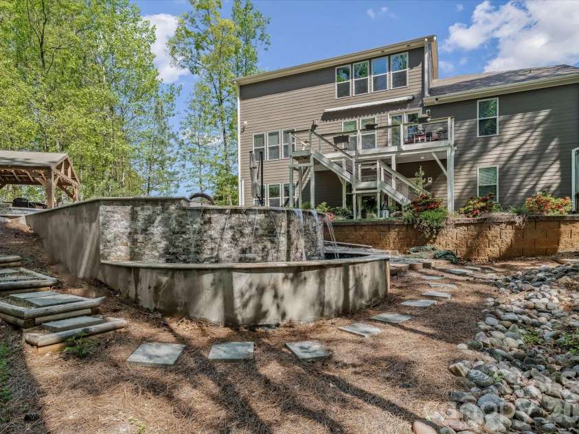 111 Abbeville Lane, Mooresville, NC 28117.  MLS# CAR4368339, YatesRealty ID 24809. Great Pool for Entertaining or Relaxing