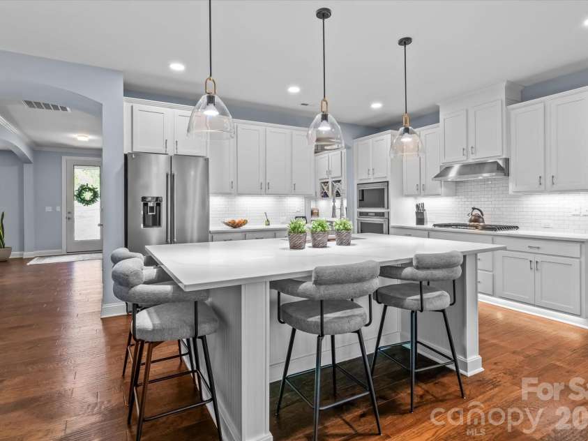 111 Abbeville Lane, Mooresville, NC 28117.  MLS# CAR4368339, YatesRealty ID 24809. Kitchen with quartz countertops
