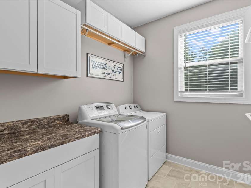 111 Abbeville Lane, Mooresville, NC 28117.  MLS# CAR4368339, YatesRealty ID 24809. Laundry Room