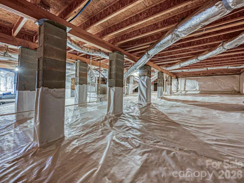 205 Pumpkin Seed Court, Matthews, NC 28104.  MLS# CAR4350087, YatesRealty ID 2481. Encapsulated Crawl Space