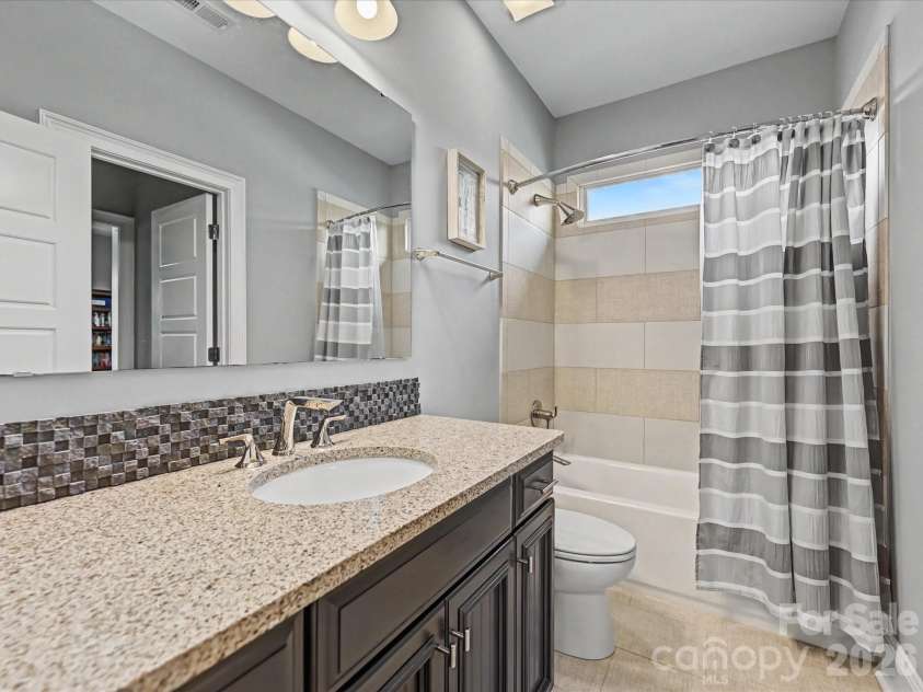 205 Pumpkin Seed Court, Matthews, NC 28104.  MLS# CAR4350087, YatesRealty ID 2481. Jack & Jill Bath