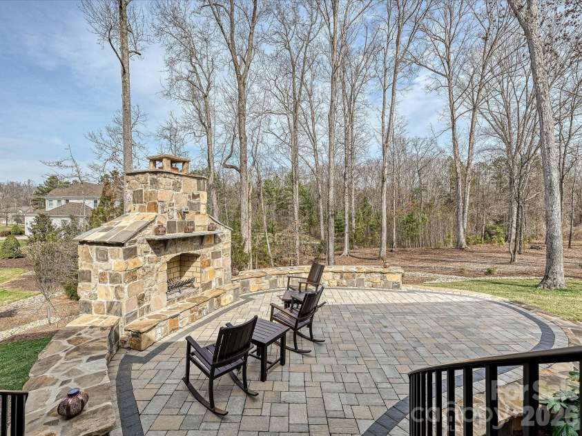 205 Pumpkin Seed Court, Matthews, NC 28104.  MLS# CAR4350087, YatesRealty ID 2481. Patio/Fireplace