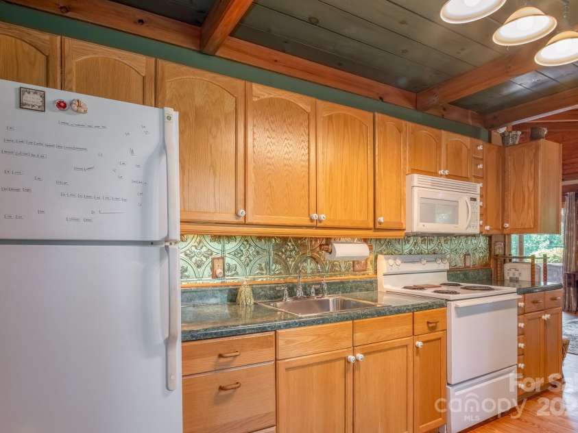 55 Bearwallow Road, Leicester, NC 28748.  MLS# CAR4278949, YatesRealty ID 24812. Kitchen
