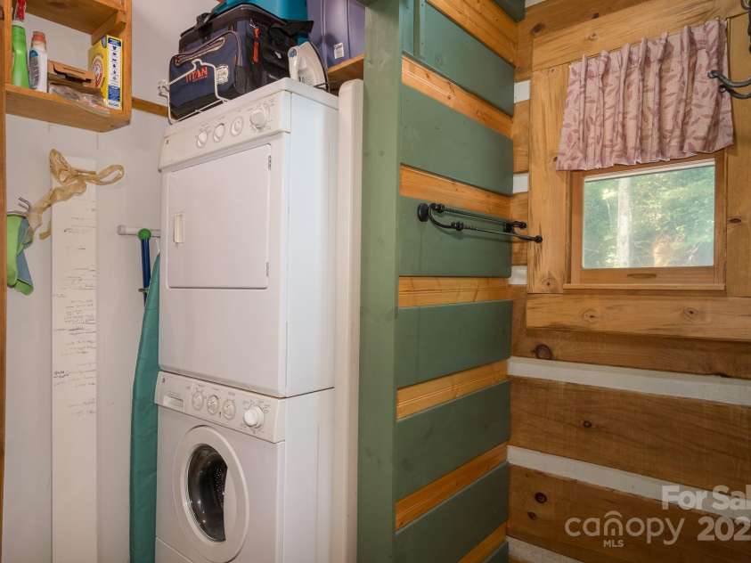 55 Bearwallow Road, Leicester, NC 28748.  MLS# CAR4278949, YatesRealty ID 24812. Laundry Closet in Bathroom