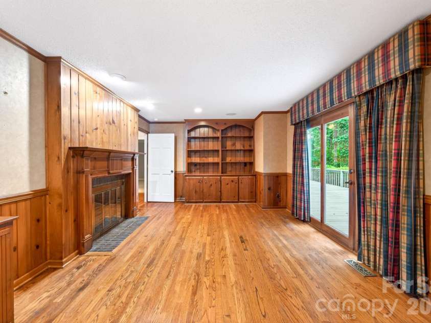 2804 Wimbledon Drive, Gastonia, NC 28056.  MLS# CAR4376535, YatesRealty ID 24815. Den/office space with built-ins and fireplace.