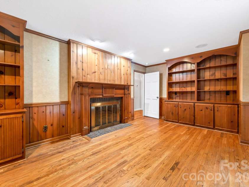 2804 Wimbledon Drive, Gastonia, NC 28056.  MLS# CAR4376535, YatesRealty ID 24815. Den/office space with built-ins and fireplace.