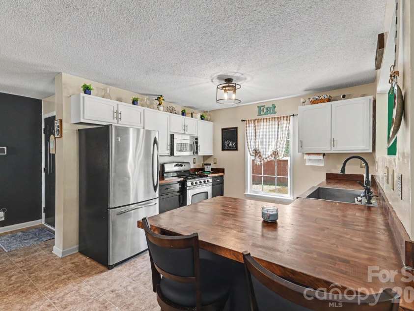 8664 Red Road, Rockwell, NC 28138.  MLS# CAR4378241, YatesRealty ID 24818. Kitchen - Bar