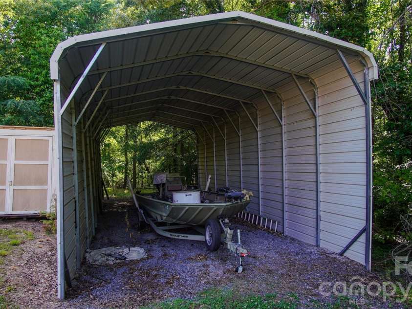 204 Old Stagecoach Road, Lawndale, NC 28090.  MLS# CAR4384627, YatesRealty ID 24830. Camper side Storage