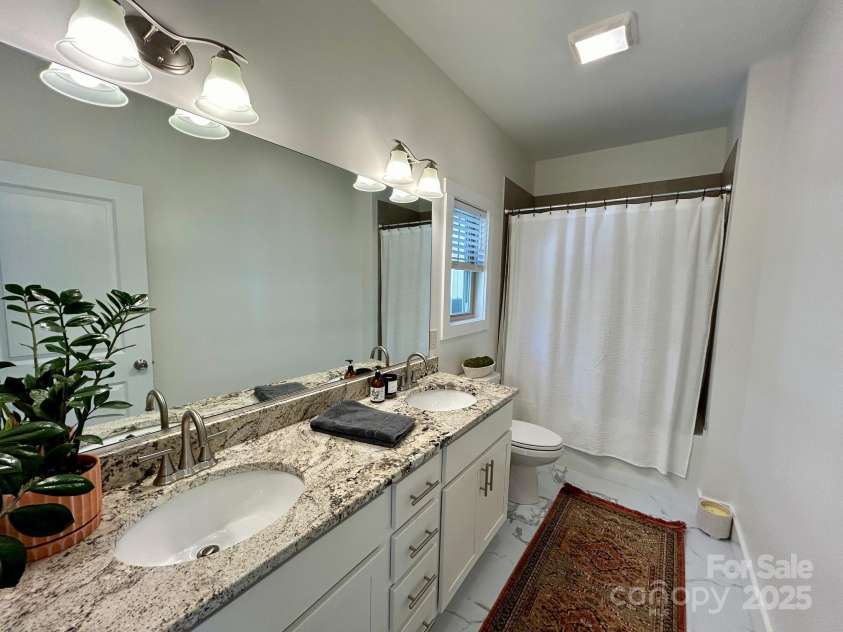 24 Wheeler Road, Weaverville, NC 28787.  MLS# CAR4252449, YatesRealty ID 24830. Primary Bath