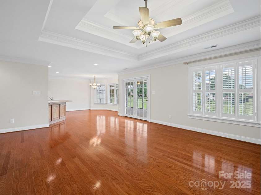 2872 Wheat Field Court, Lincolnton, NC 28092.  MLS# CAR4271500, YatesRealty ID 24831. LIVING ROOM TOWARD BREAKFAST NOOK AND KITCHEN