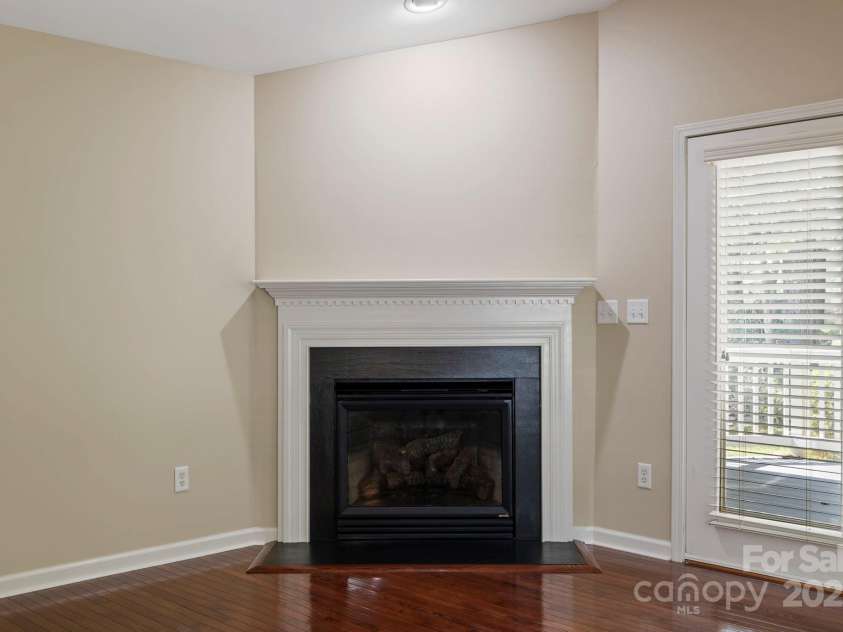 241 Fairway View Drive, Etowah, NC 28729.  MLS# CAR4304614, YatesRealty ID 2484. Gas log fireplace in Great room