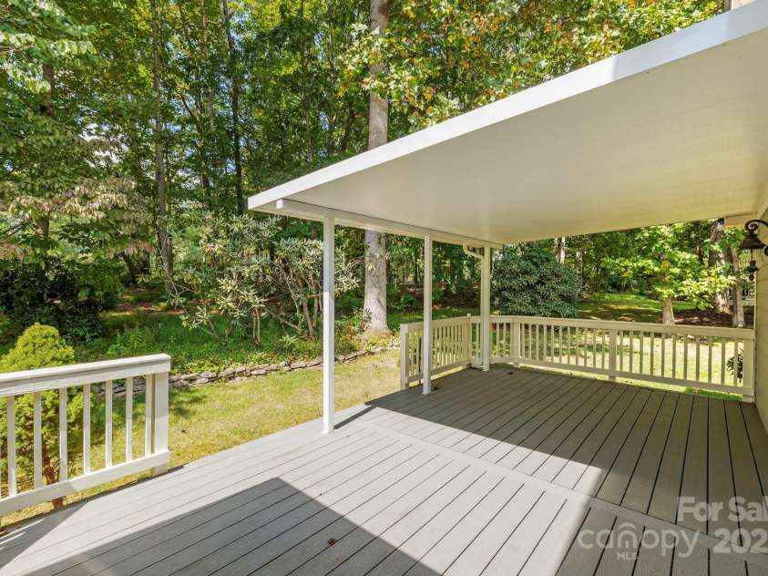 241 Fairway View Drive, Etowah, NC 28729.  MLS# CAR4304614, YatesRealty ID 2484. Uncovered section of back porch for sun and grilling!