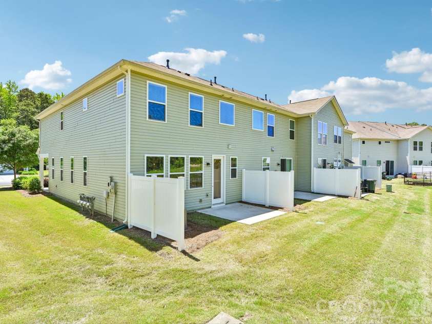1325 Southern Sugar Drive, Charlotte, NC 28262.  MLS# CAR4381363, YatesRealty ID 24842. Private backyard/patio area