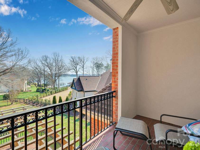 18326 Bowsprit Pointe Road, Cornelius, NC 28031.  MLS# CAR4350725, YatesRealty ID 24848. Incredible waterview from the Private balcony from the primary bedroom