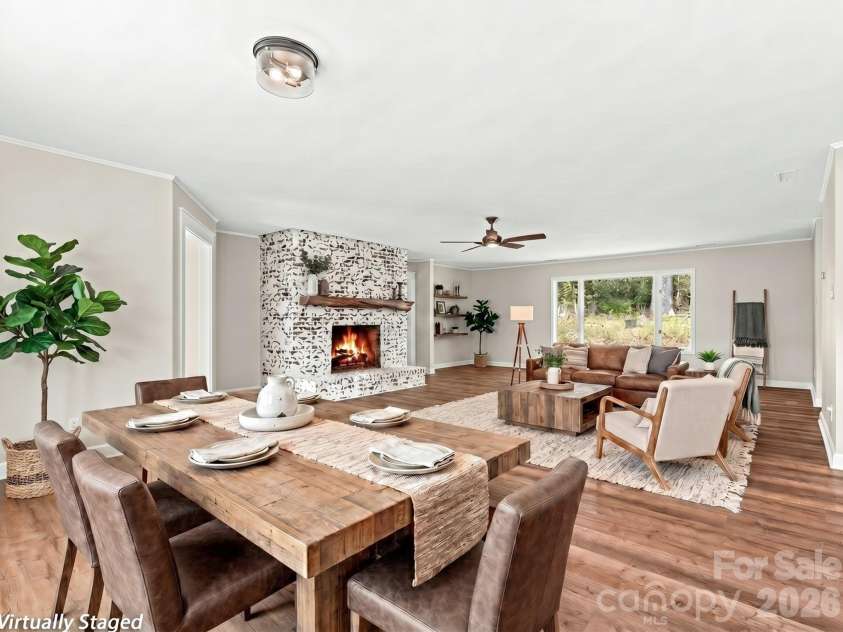195 Red Bird Road, Spruce Pine, NC 28777.  MLS# CAR4380528, YatesRealty ID 24850. Dining area into Great Room~ virtually staged