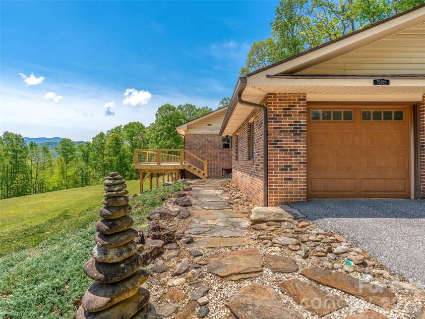 195 Red Bird Road, Spruce Pine, NC 28777.  MLS# CAR4380528, YatesRealty ID 24850. Main level access up 5 steps